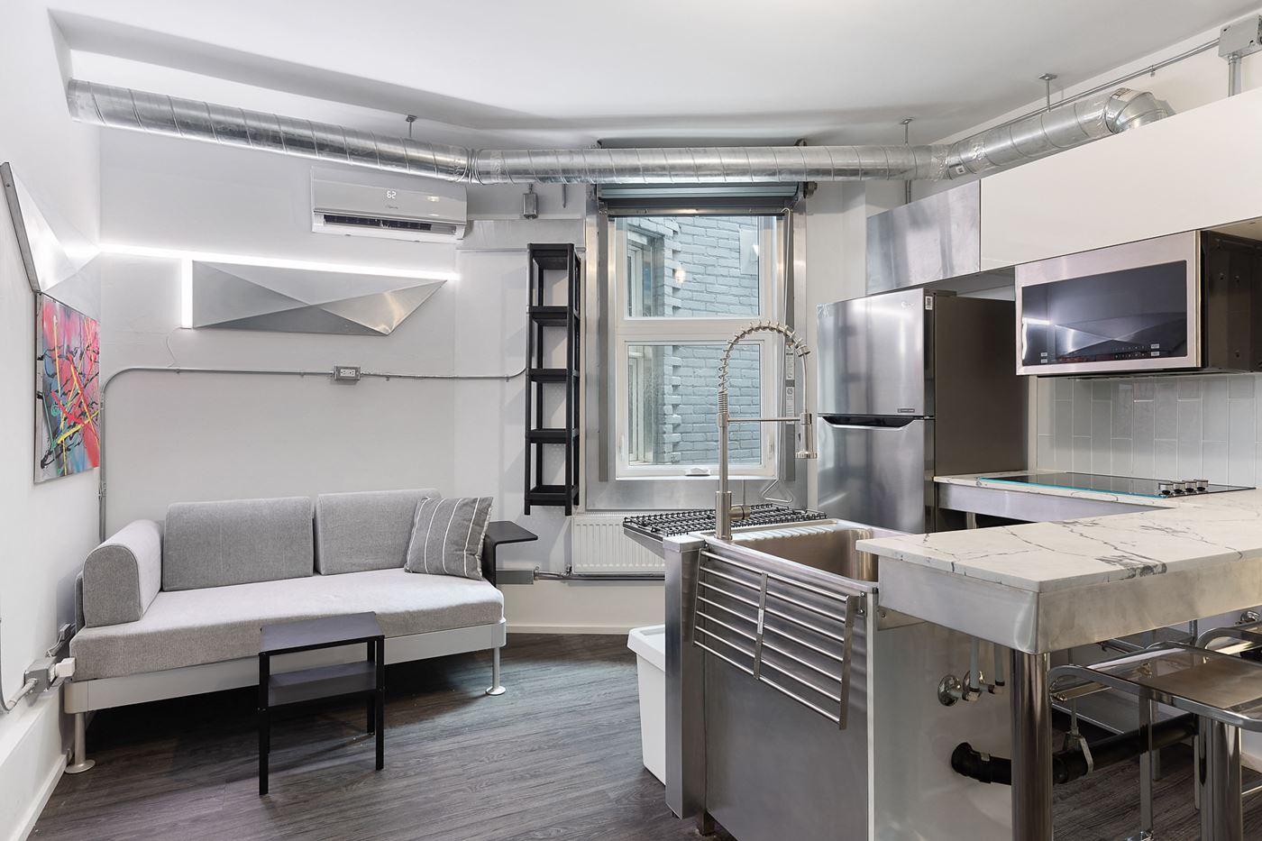 Open living and kitchen at The New York